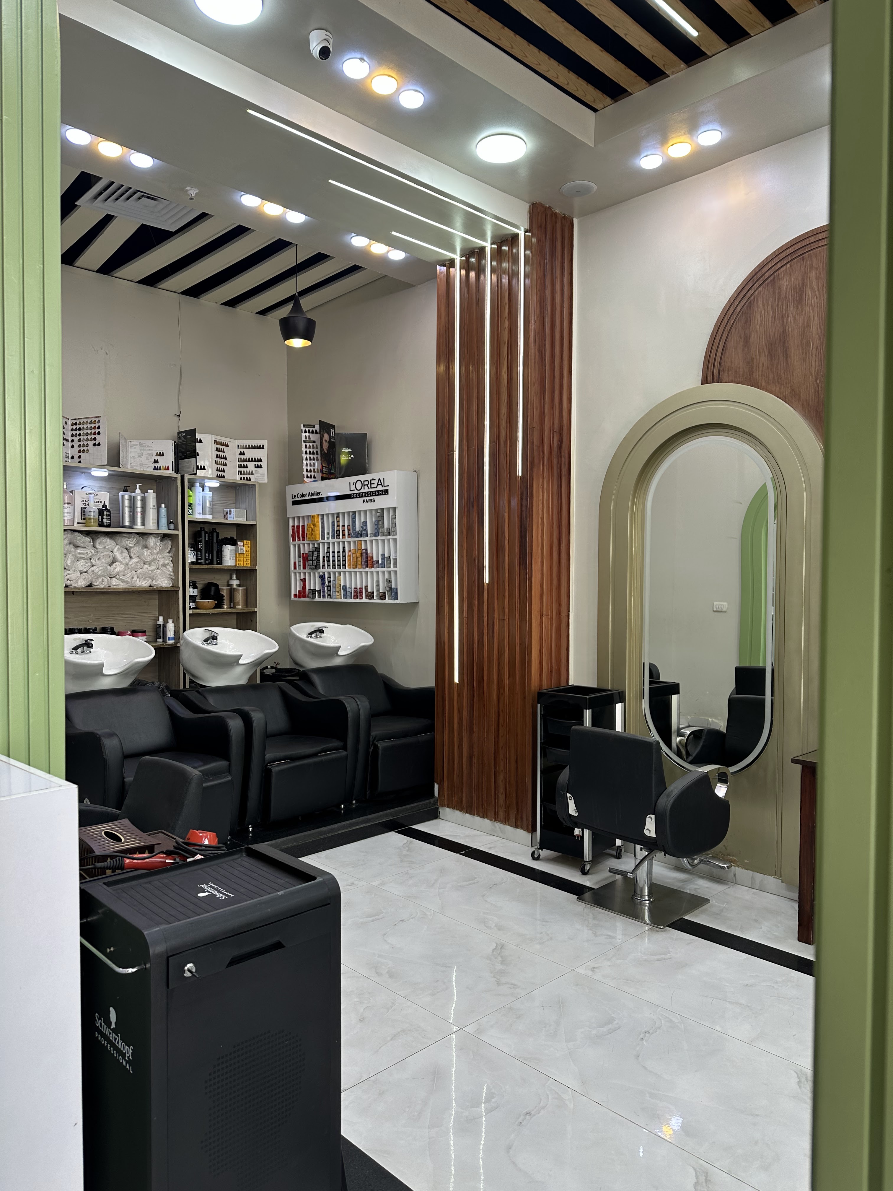 Green arched doorway inside the Sheikh Zayed branch